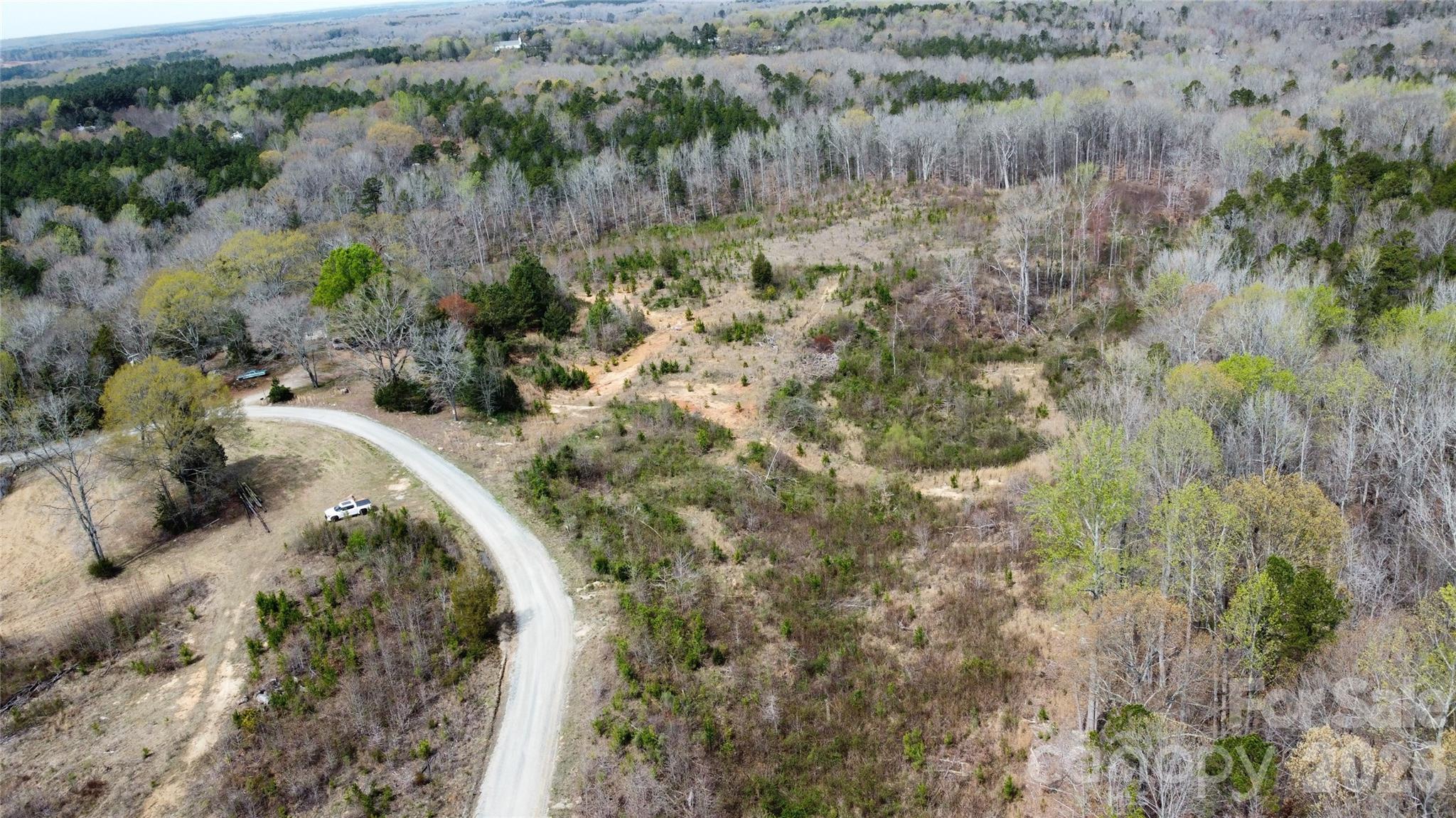 6327 Witherspoon Drive Lancaster, SC 29720 - Photo 31 of 41 a view of a forest with a tree