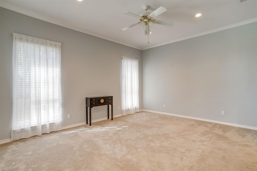 8700 Bellechase Road Granbury, TX 76049 - Photo 16 of 30 an empty room with a empty space and windows