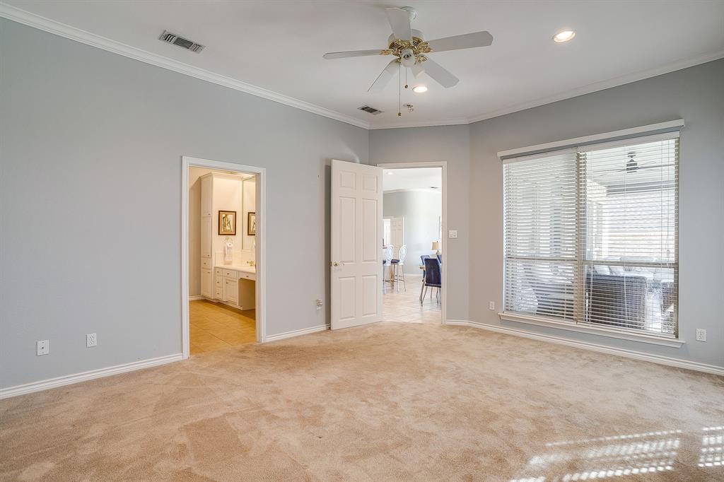 8700 Bellechase Road Granbury, TX 76049 - Photo 17 of 30 a view of an empty room with a window