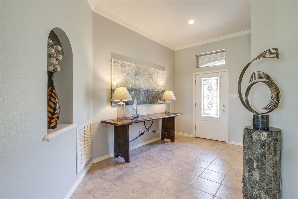 8700 Bellechase Road Granbury, TX 76049 - Photo 6 of 30 a room with furniture and window