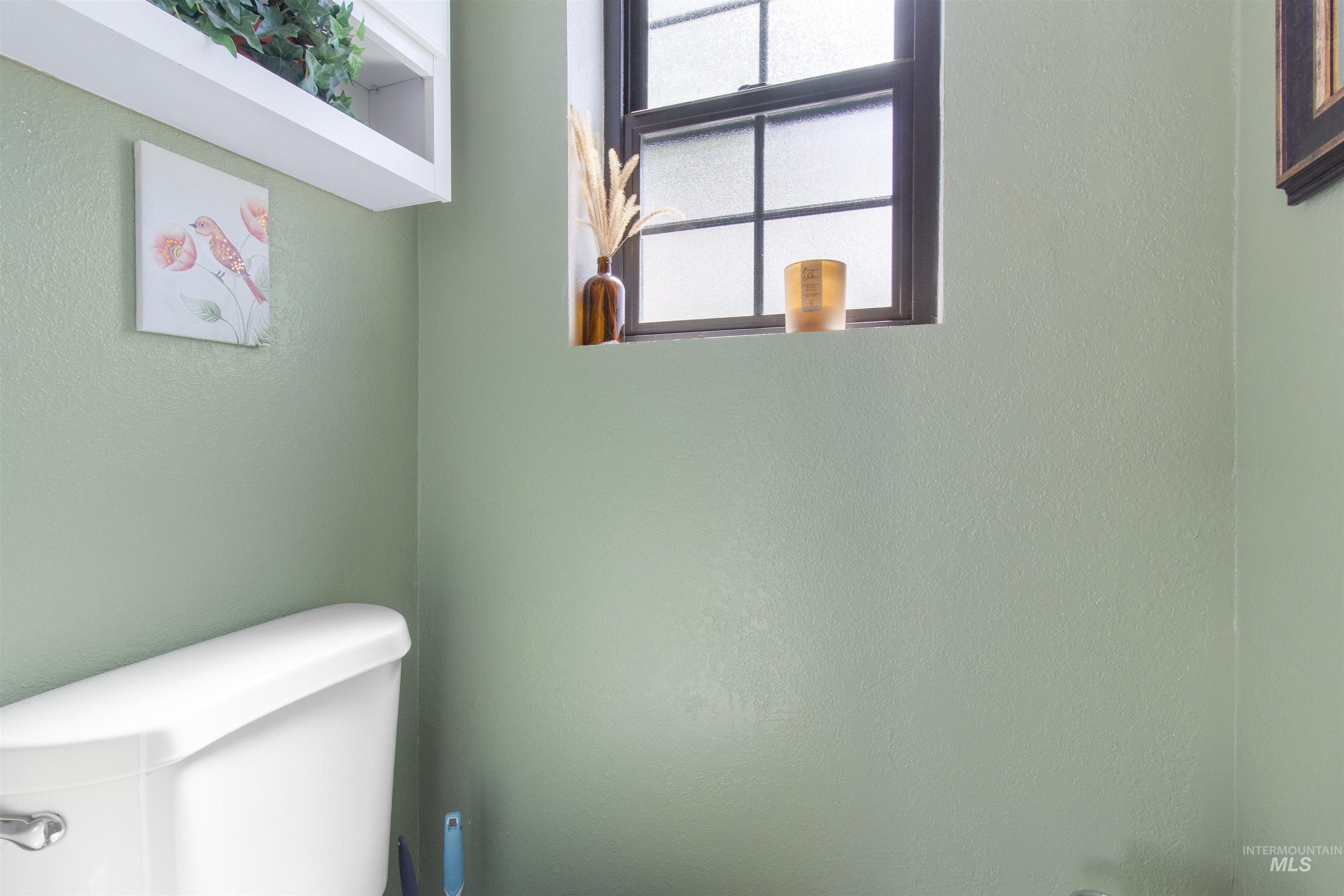 106 West Magic Road Shoshone, ID 83352 - Photo 12 of 45 Recessed window with frosted glass pane and dark frame