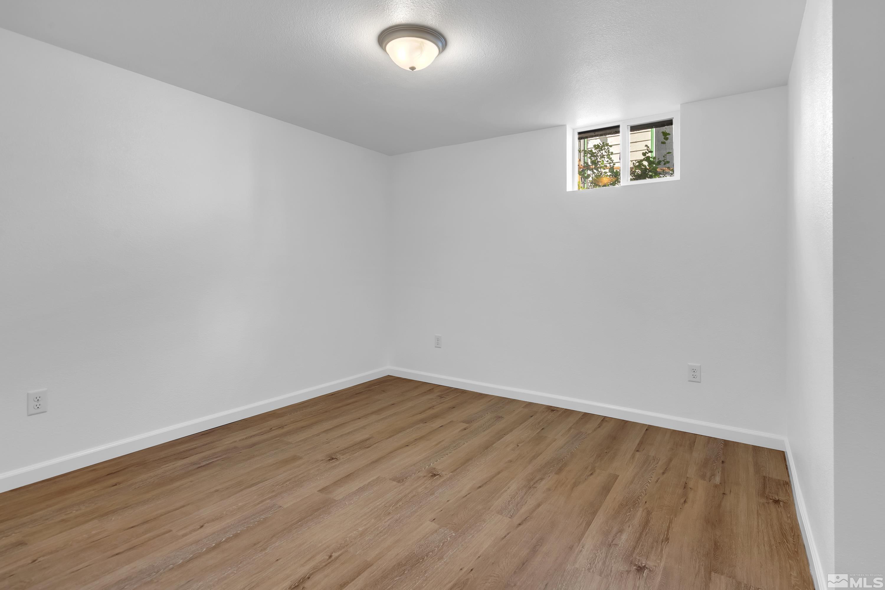 840 Lodge Avenue Reno, NV 89503 - Photo 13 of 19 a view of a room with wooden floor and window
