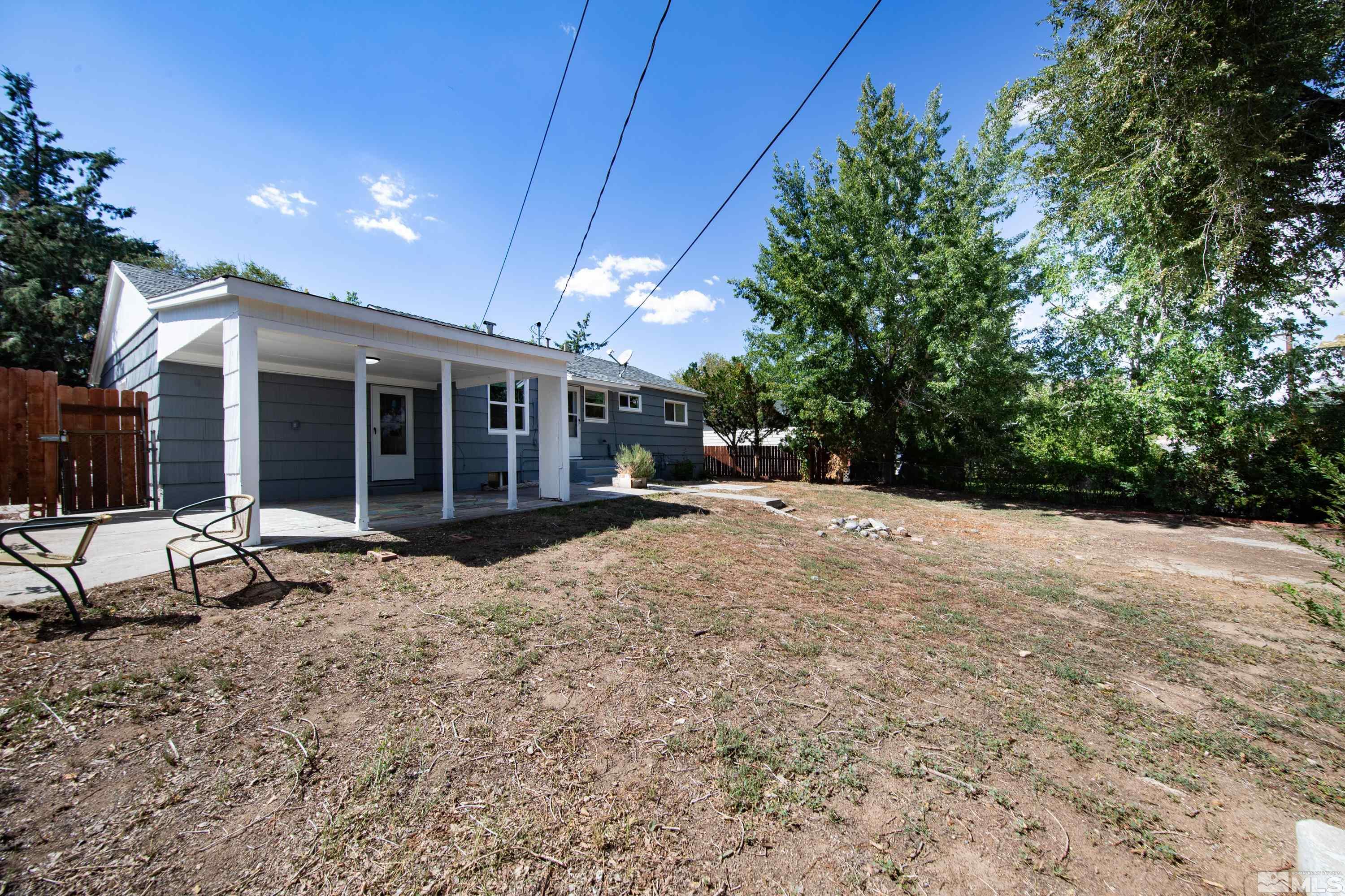 840 Lodge Avenue Reno, NV 89503 - Photo 17 of 19 a view of a house with backyard and porch
