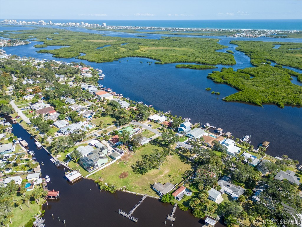 5948 Riverside Drive Port Orange, FL 32127 - Photo 13 of 27 a view of a lake with a lake