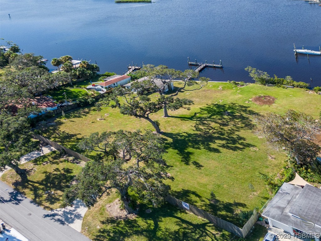 5948 Riverside Drive Port Orange, FL 32127 - Photo 7 of 27 a view of a backyard of a house