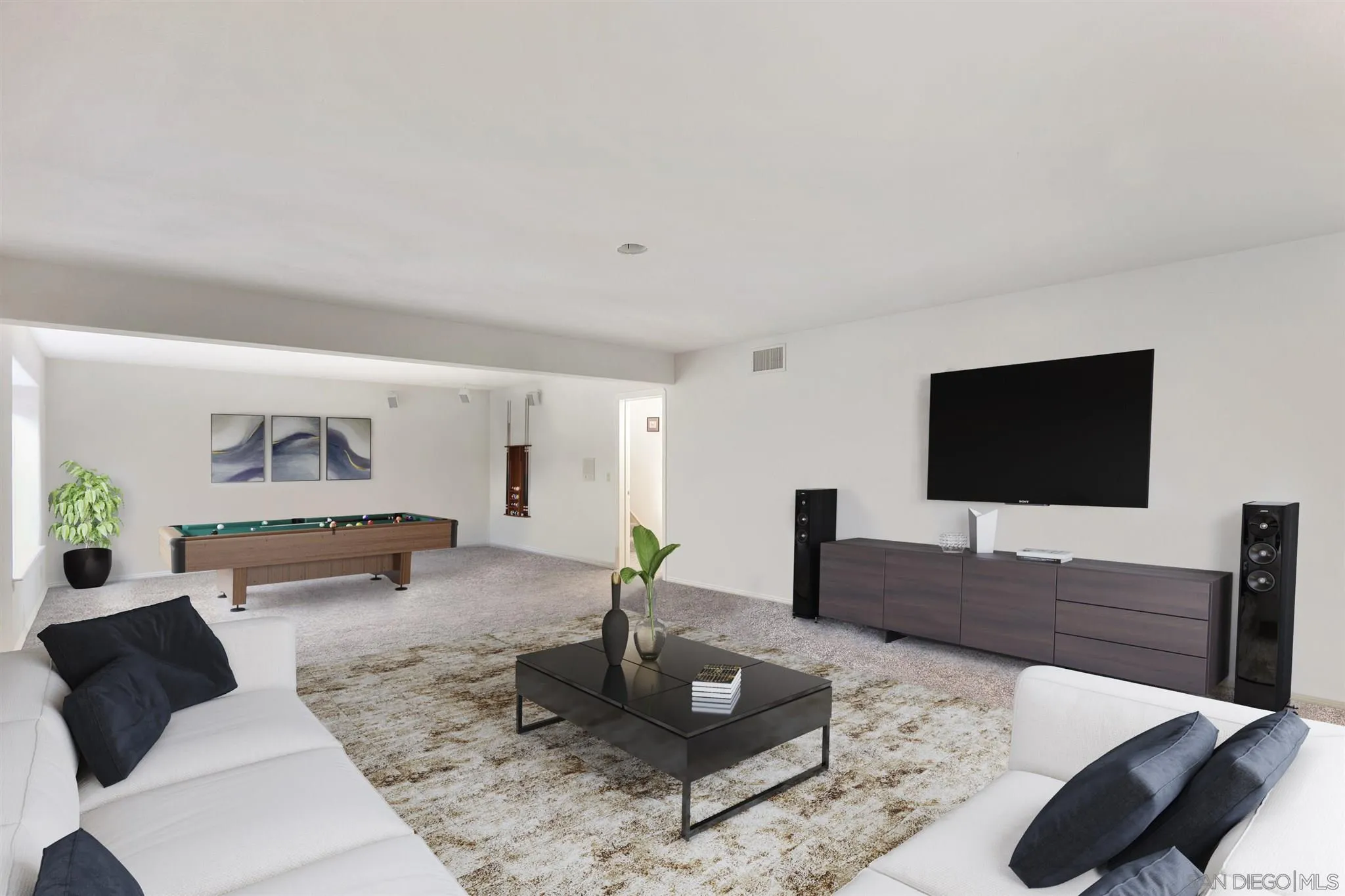 13739 Shadowood Lane Valley Center, CA 92082 - Photo 34 of 37 a living room with furniture and a flat screen tv