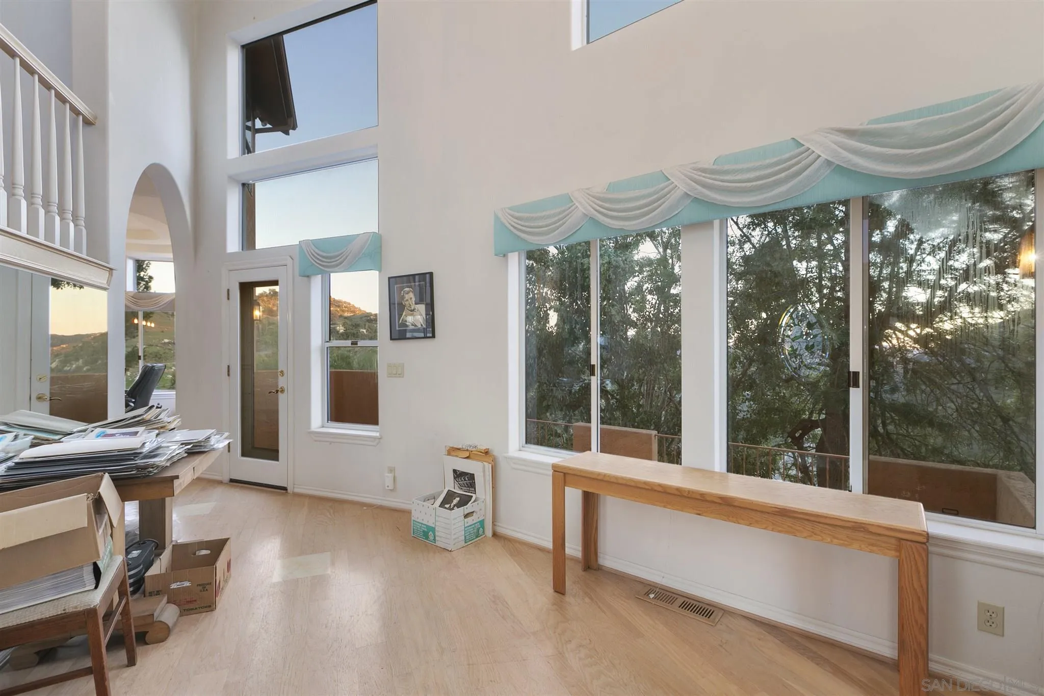 13739 Shadowood Lane Valley Center, CA 92082 - Photo 10 of 37 a view of a room with gym equipment and floor to ceiling window