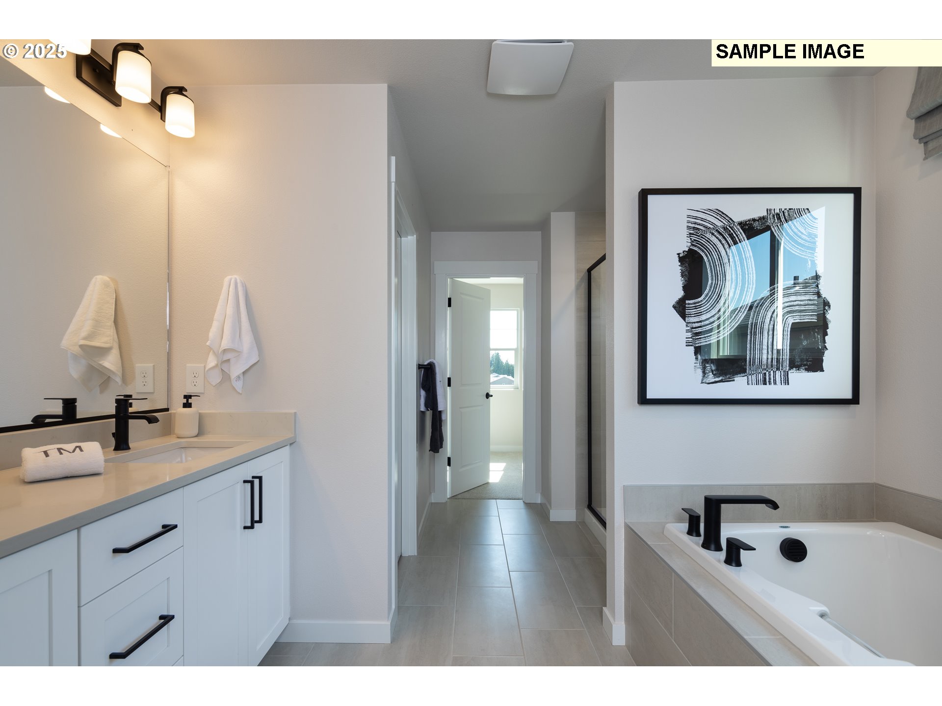 3799 Southwest 37th Street Gresham, OR 97080 - Photo 11 of 14 a bathroom with a sink a mirror and a bathtub