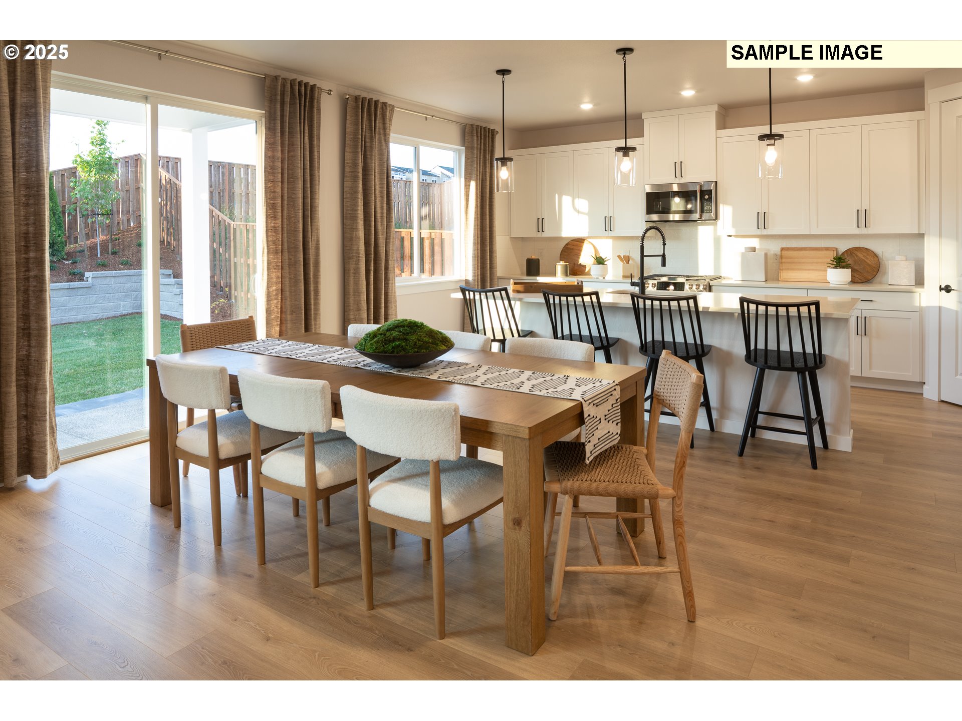 3799 Southwest 37th Street Gresham, OR 97080 - Photo 7 of 14 a view of a dining room with furniture and wooden floor