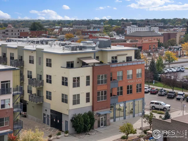 an aerial view of a town with couple of houses