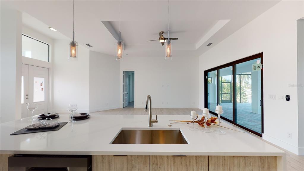 10510 Rainsville Street Port Charlotte, FL 33981 - Photo 18 of 37 a kitchen with a sink and a window
