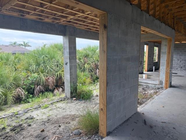 10510 Rainsville Street Port Charlotte, FL 33981 - Photo 4 of 37 a view of a backyard with plants