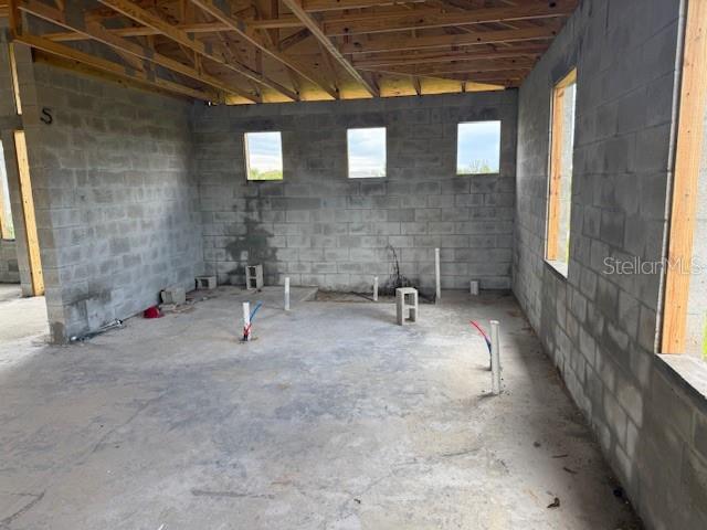 10510 Rainsville Street Port Charlotte, FL 33981 - Photo 5 of 37 a view of a livingroom with a chair and table