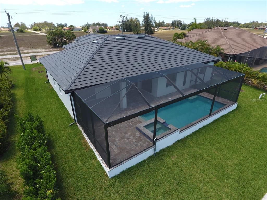 10510 Rainsville Street Port Charlotte, FL 33981 - Photo 7 of 37 an aerial view of a house having yard