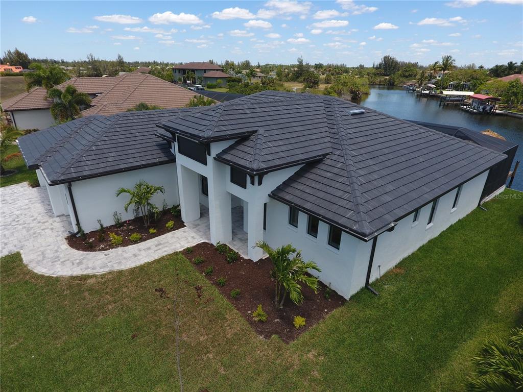 10510 Rainsville Street Port Charlotte, FL 33981 - Photo 9 of 37 a view of a house with a backyard