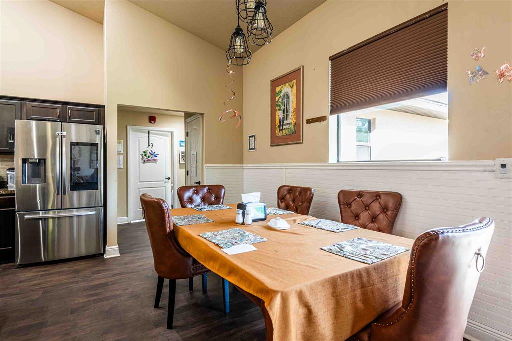 Undisclosed Address Spring Hill, FL 34608 - Photo 10 of 39 a dining room with furniture and window