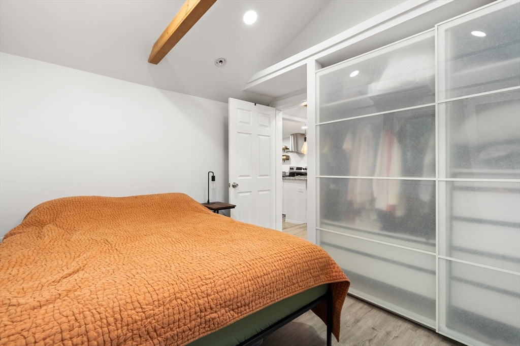 47 South Shore Road Holbrook, MA 02343 - Photo 17 of 30 a bedroom with a bed and a walk in closet
