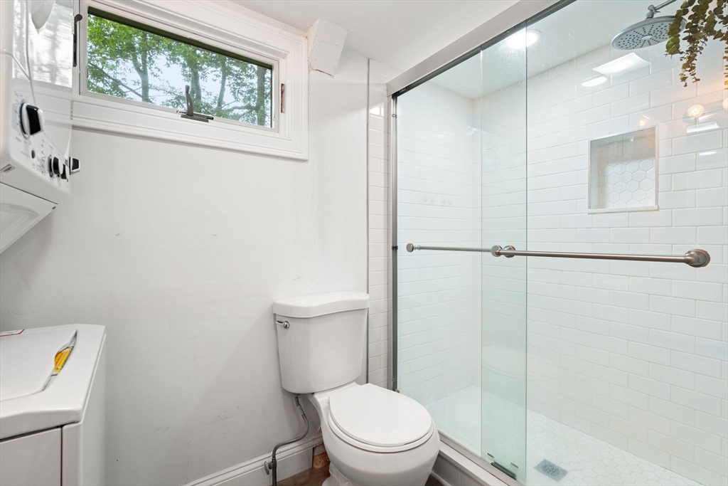 47 South Shore Road Holbrook, MA 02343 - Photo 20 of 30 a white toilet sitting next to a bathroom sink