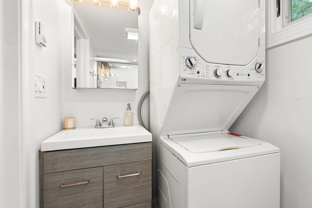 47 South Shore Road Holbrook, MA 02343 - Photo 21 of 30 a utility room with dryer and washer