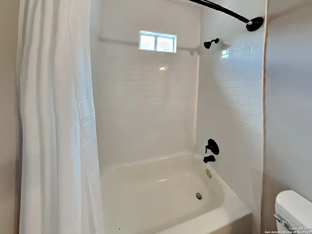 a bathroom with a bathtub