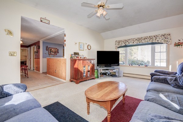 88 Mason Road Townsend, MA 01474 - Photo 19 of 30 a living room with furniture and a flat screen tv
