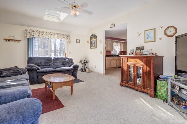 88 Mason Road Townsend, MA 01474 - Photo 20 of 30 a living room with furniture and a flat screen tv