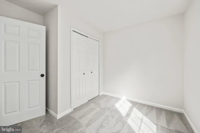 a view of a closet in a room