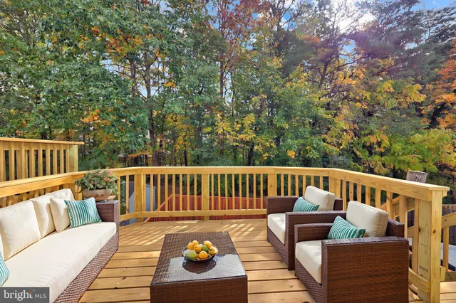 a view of balcony with wooden floor