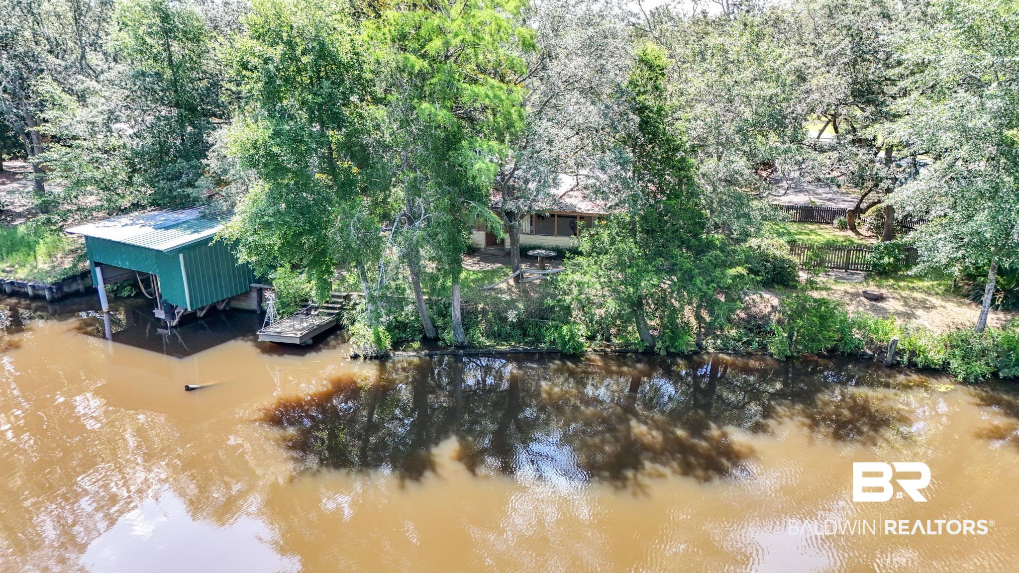 34341 Lost River Road Seminole, AL 36574 - Photo 31 of 36 Aerial view of property and surrounding area with a large body of water