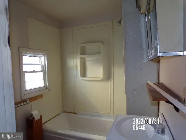 a bathroom with a toilet