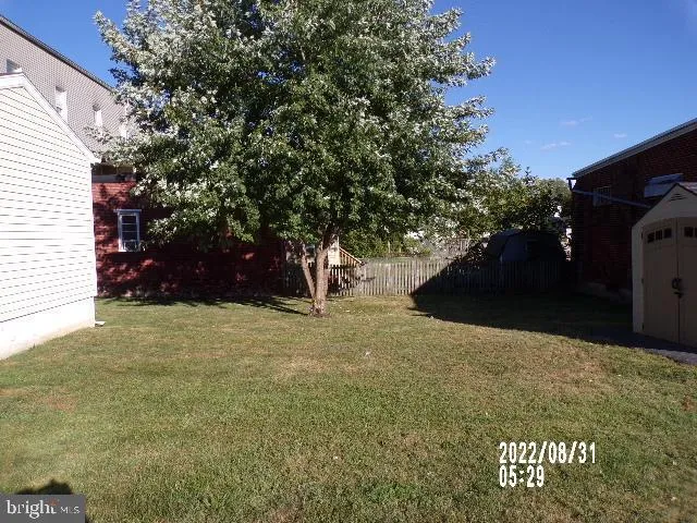 a view of outdoor space and yard