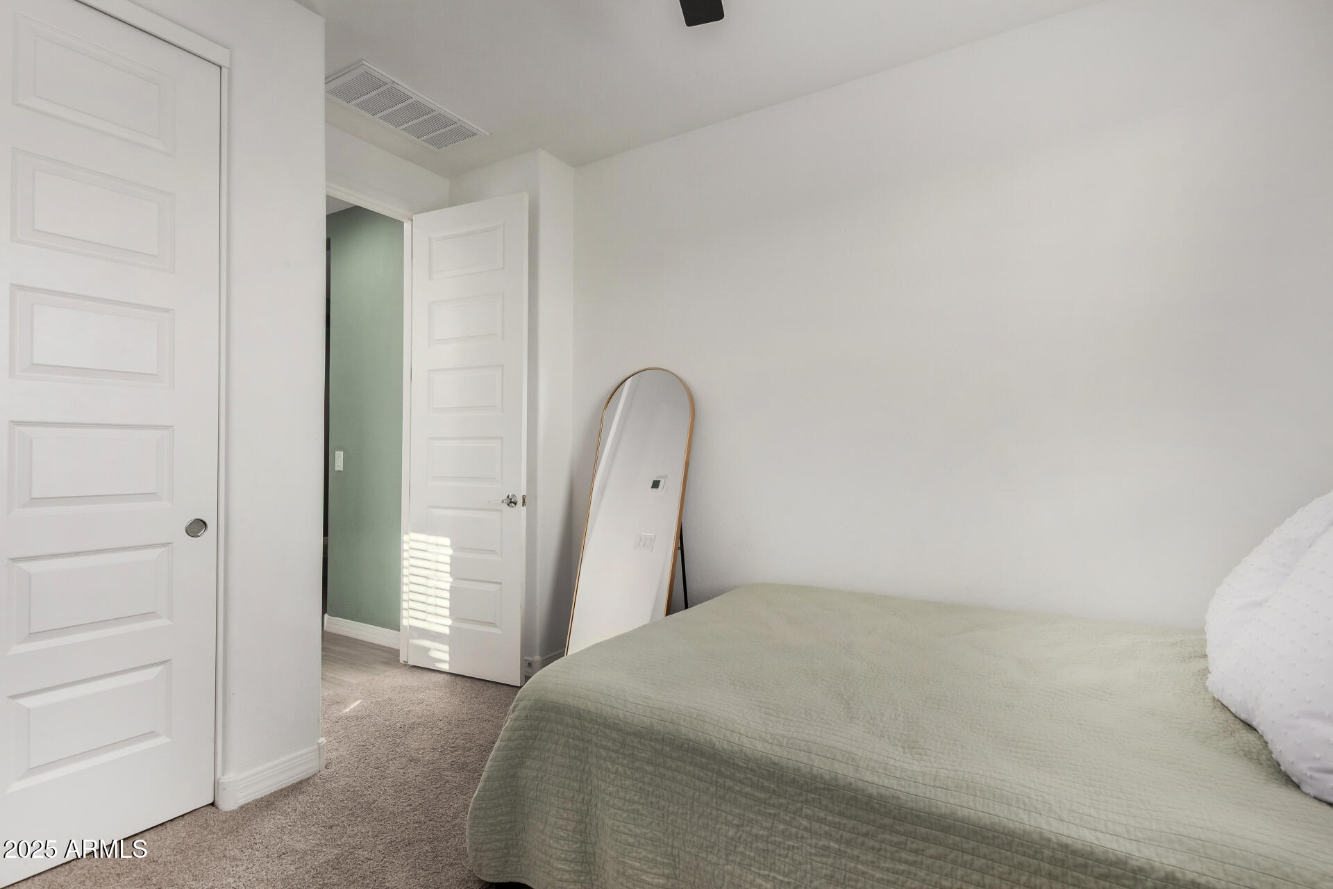 2652 South Prospector Point Road Apache Junction, AZ 85119 - Photo 21 of 37 a bedroom with a bed and a dresser