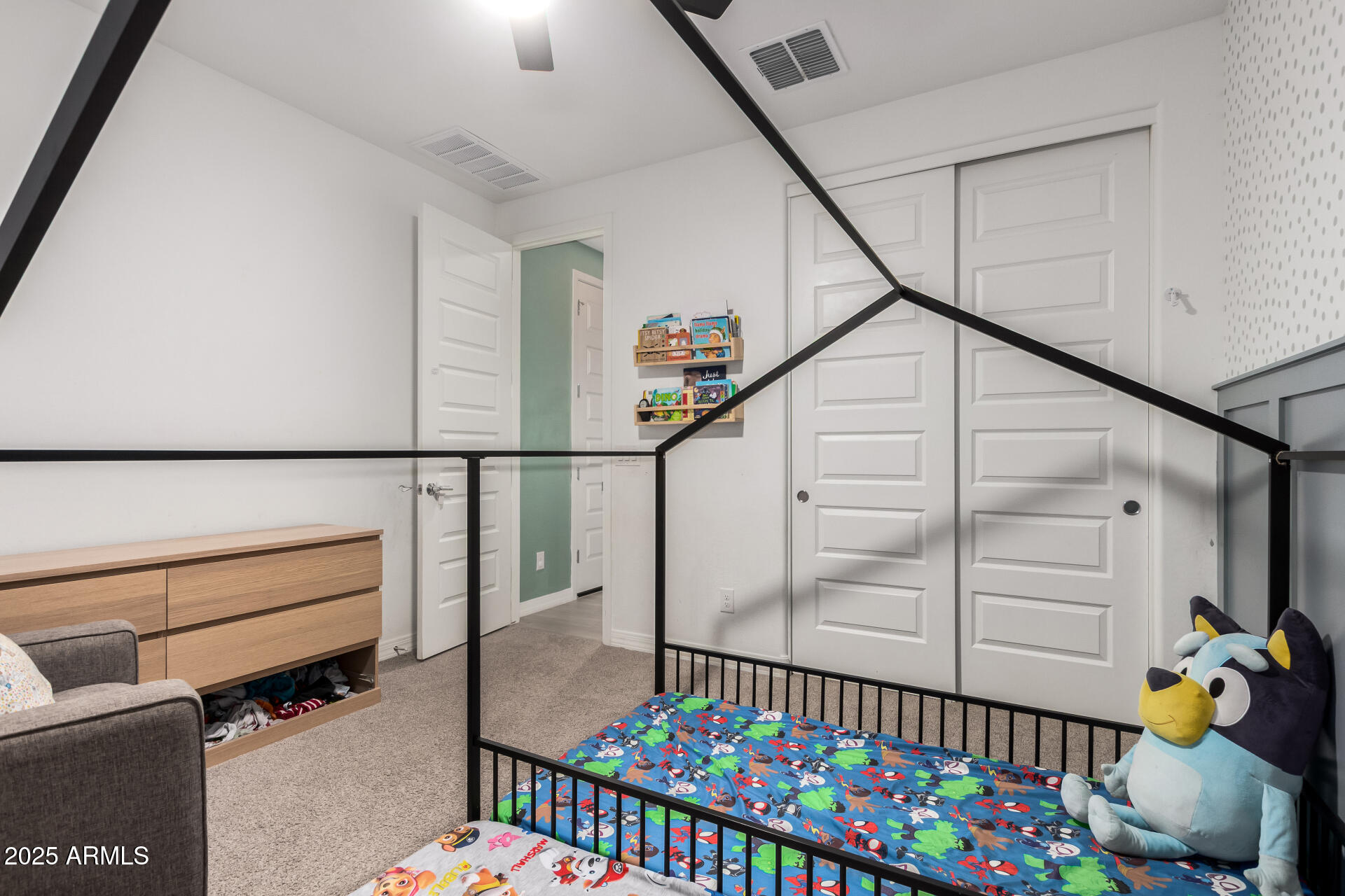 2652 South Prospector Point Road Apache Junction, AZ 85119 - Photo 26 of 37 a bedroom with furniture and a baby crib