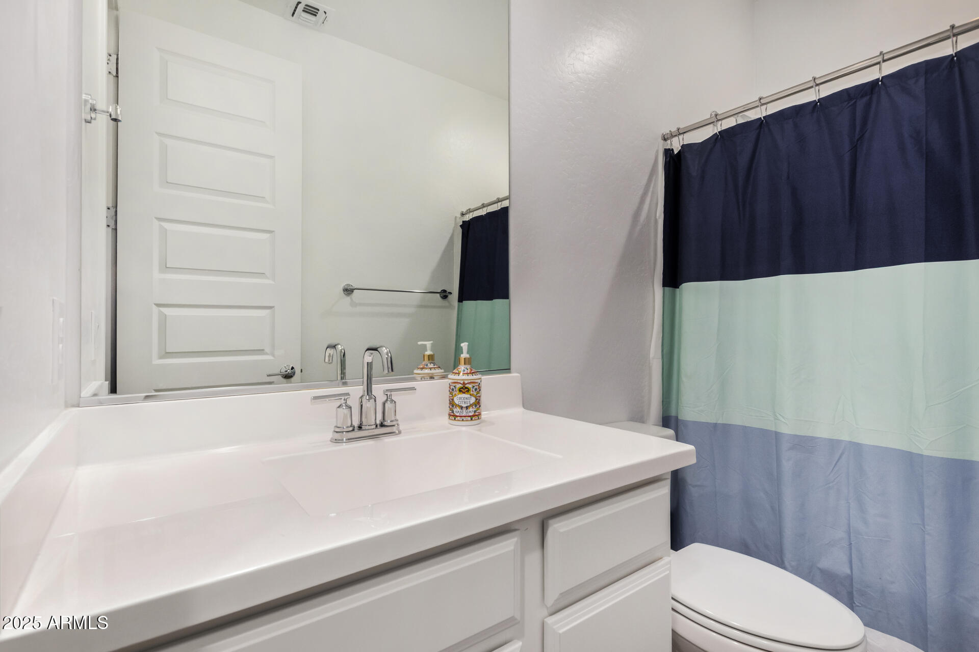 2652 South Prospector Point Road Apache Junction, AZ 85119 - Photo 27 of 37 a bathroom with a sink a toilet and mirror