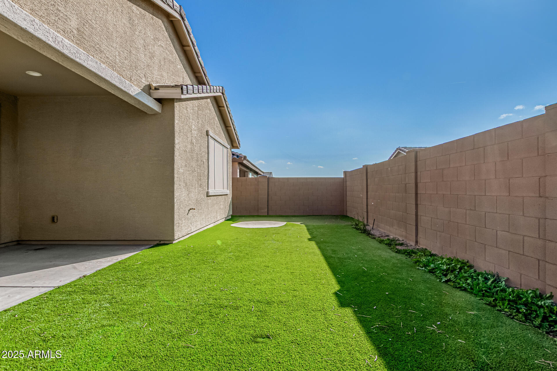 2652 South Prospector Point Road Apache Junction, AZ 85119 - Photo 37 of 37 a view of a backyard with plants