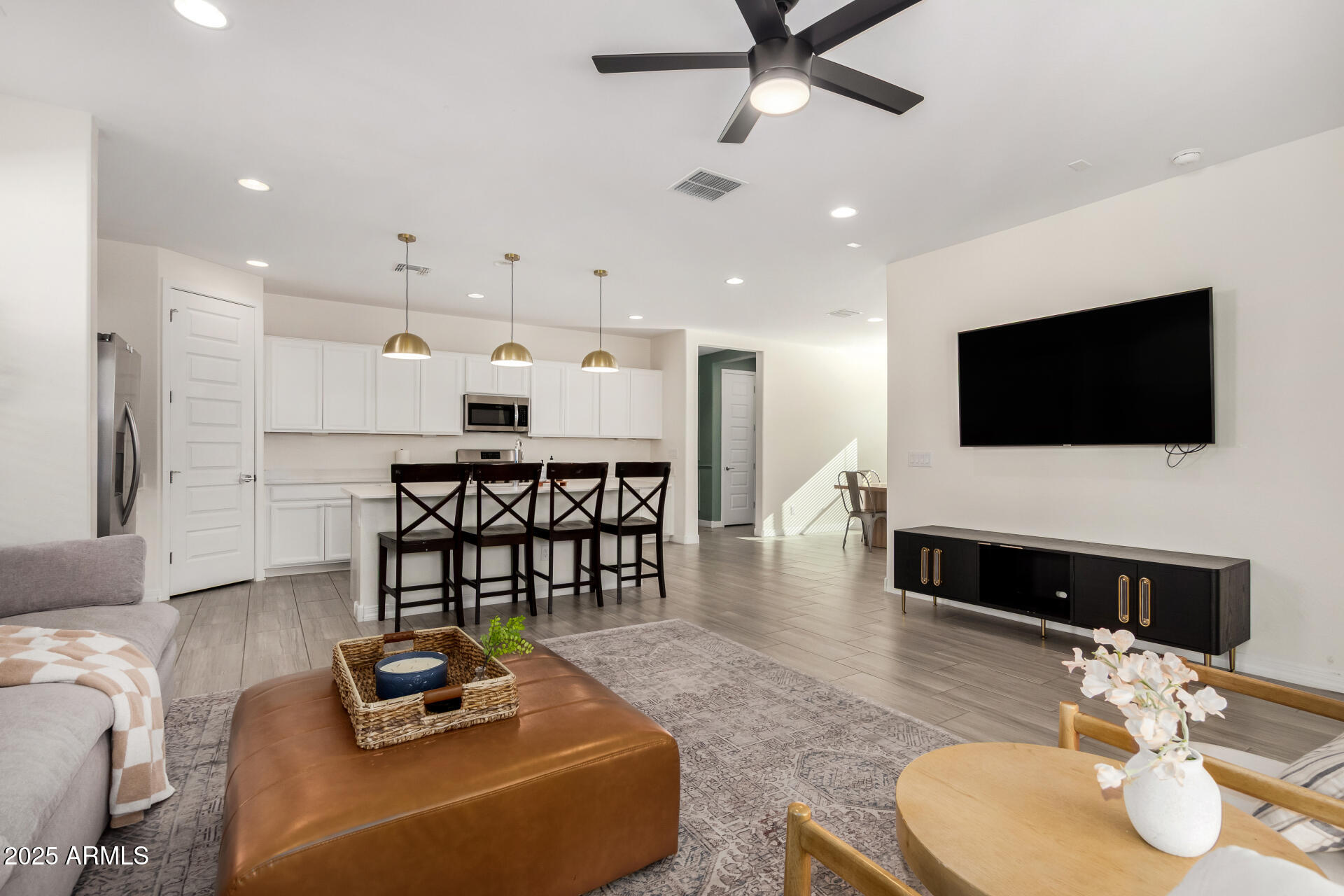 2652 South Prospector Point Road Apache Junction, AZ 85119 - Photo 7 of 37 a living room with furniture and a flat screen tv