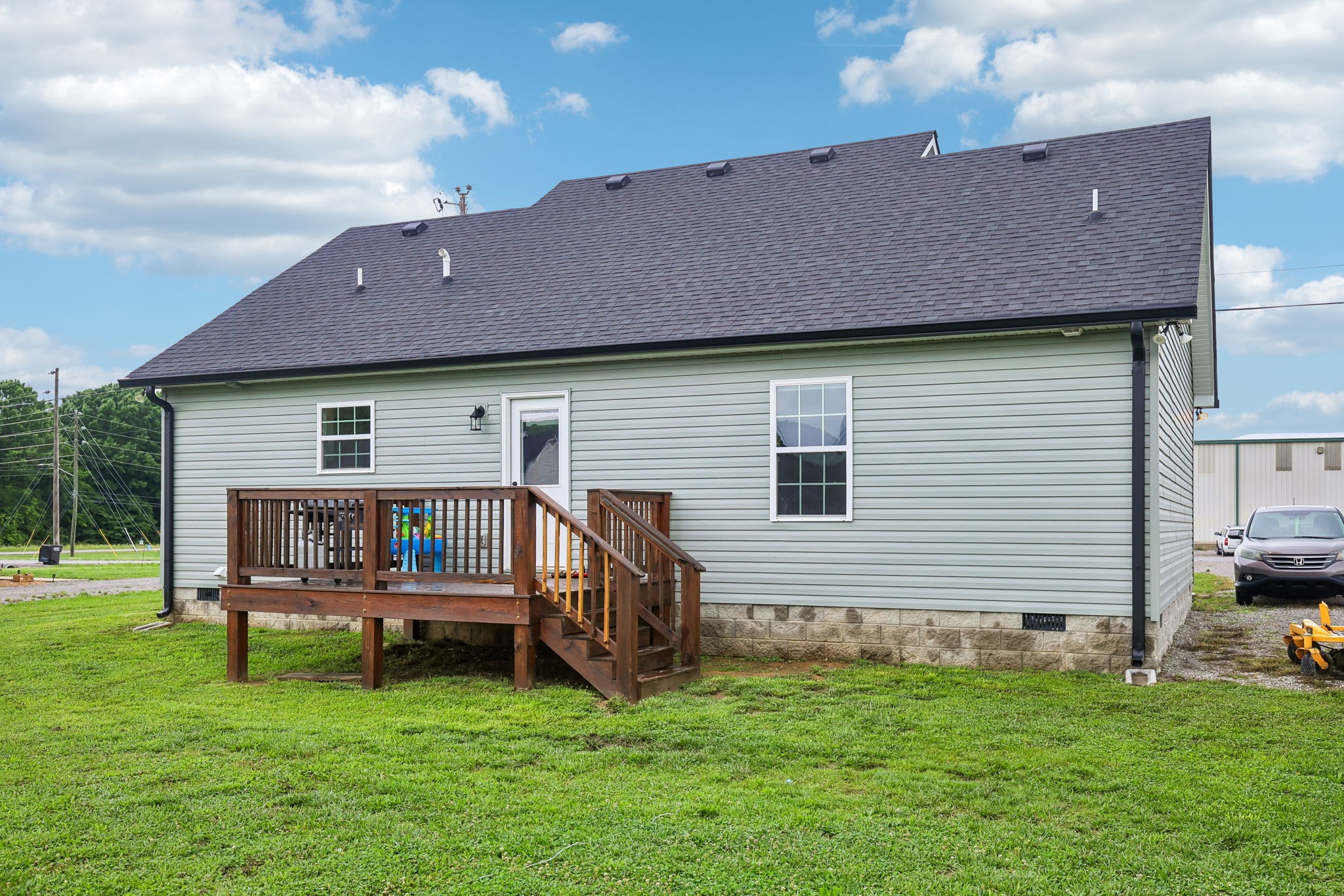 1715 Old Belfast Road Lewisburg, TN 37091 - Photo 38 of 42 a backyard of a house with garden and deck