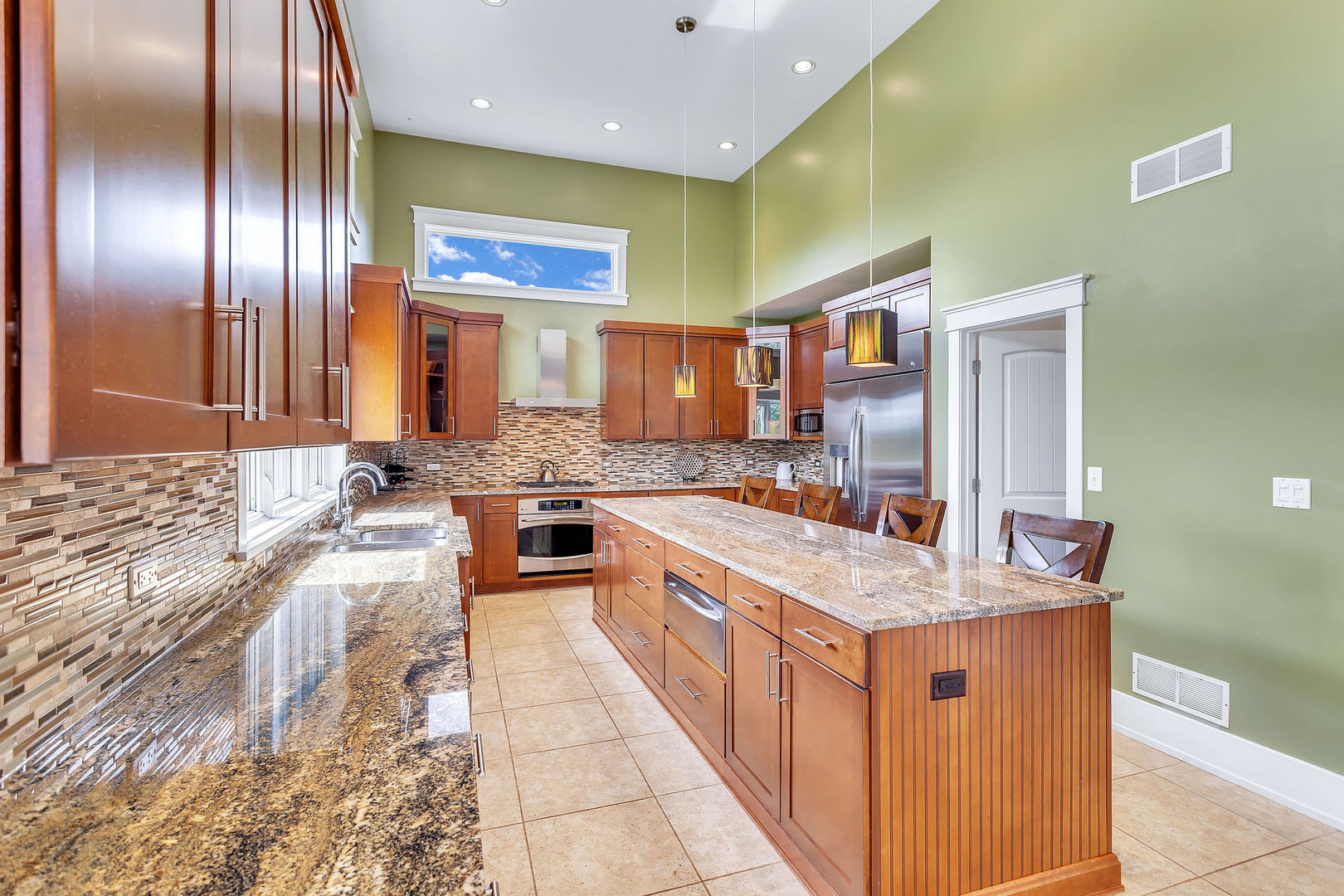 40 Stonecrest Drive Elgin, IL 60124 - Photo 15 of 63 a large kitchen with stainless steel appliances granite countertop plenty wooden cabinets