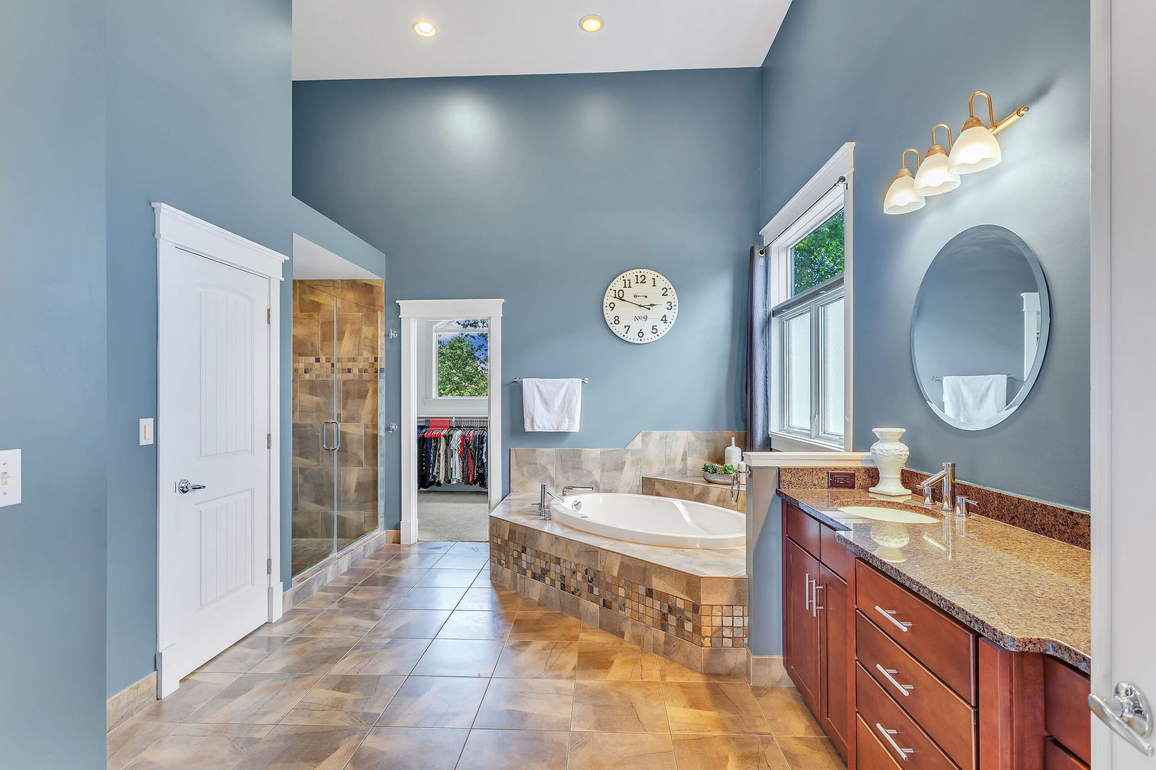 40 Stonecrest Drive Elgin, IL 60124 - Photo 25 of 63 a spacious bathroom with a double vanity sink and a mirror