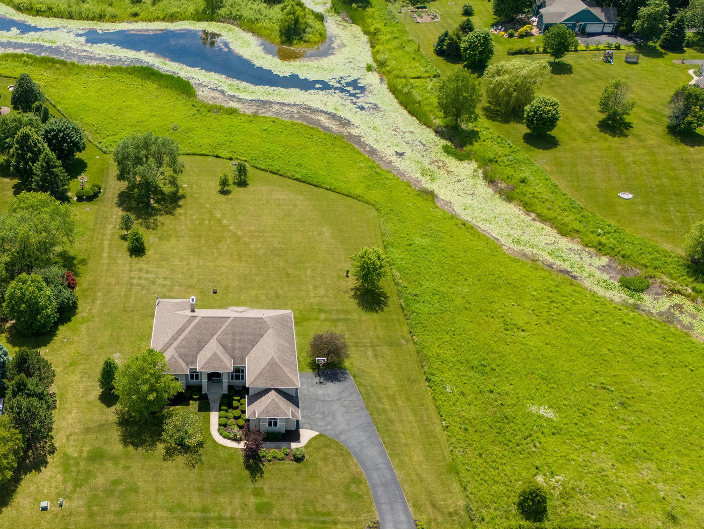 40 Stonecrest Drive Elgin, IL 60124 - Photo 3 of 63 a view of swimming pool from a lake view