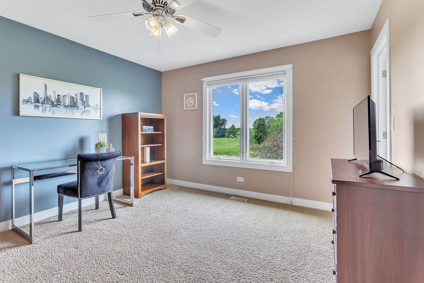 40 Stonecrest Drive Elgin, IL 60124 - Photo 40 of 63 a view of a livingroom with furniture and a window
