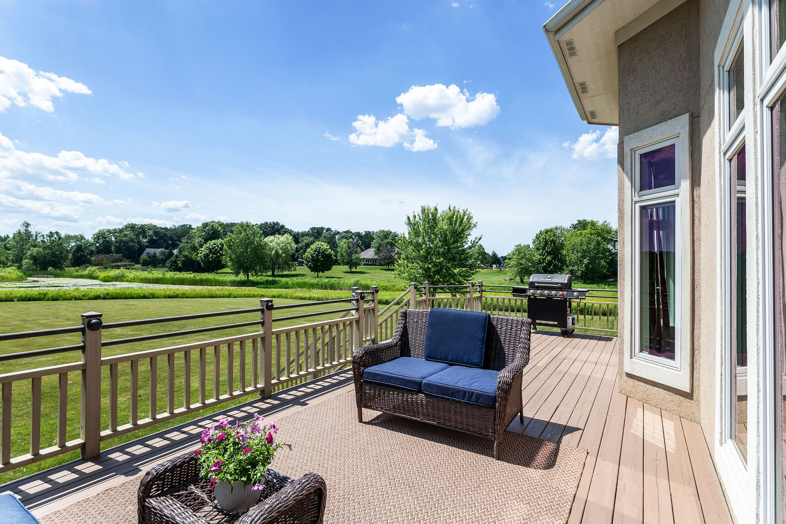 40 Stonecrest Drive Elgin, IL 60124 - Photo 44 of 63 a view of a chair and tables in the balcony