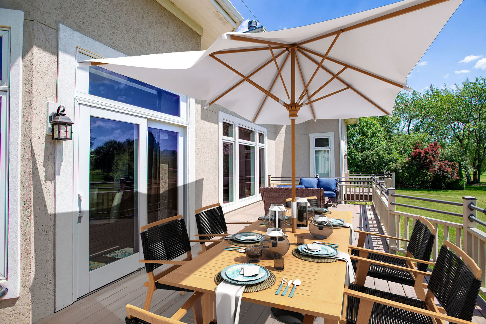 40 Stonecrest Drive Elgin, IL 60124 - Photo 45 of 63 a view of a patio with table and chairs under an umbrella