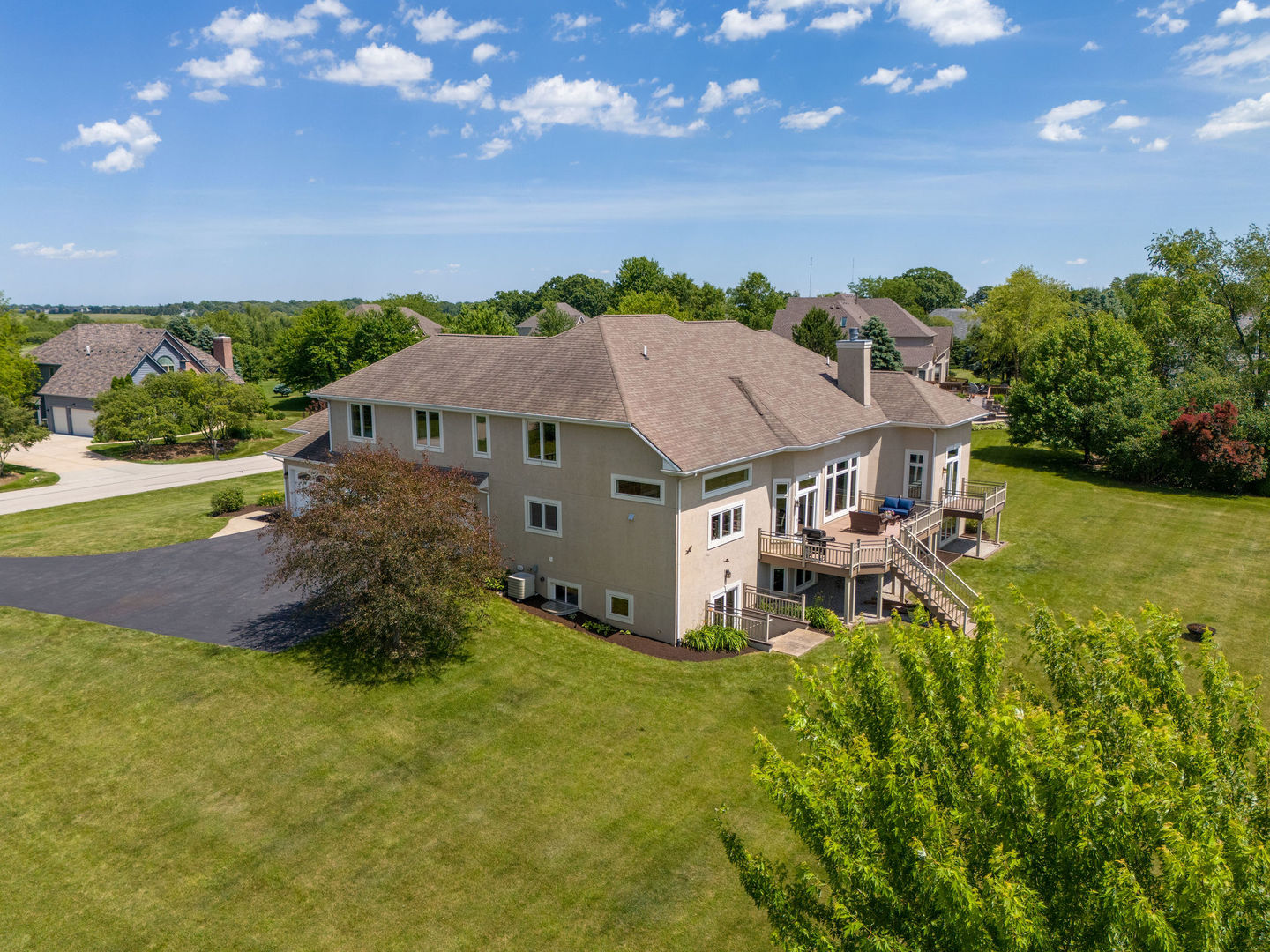 40 Stonecrest Drive Elgin, IL 60124 - Photo 49 of 63 an aerial view of a house with garden space and a patio