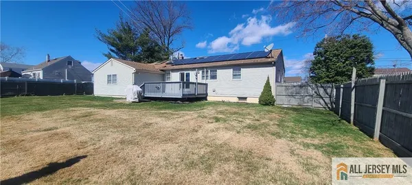 a house that has a tree in front of it