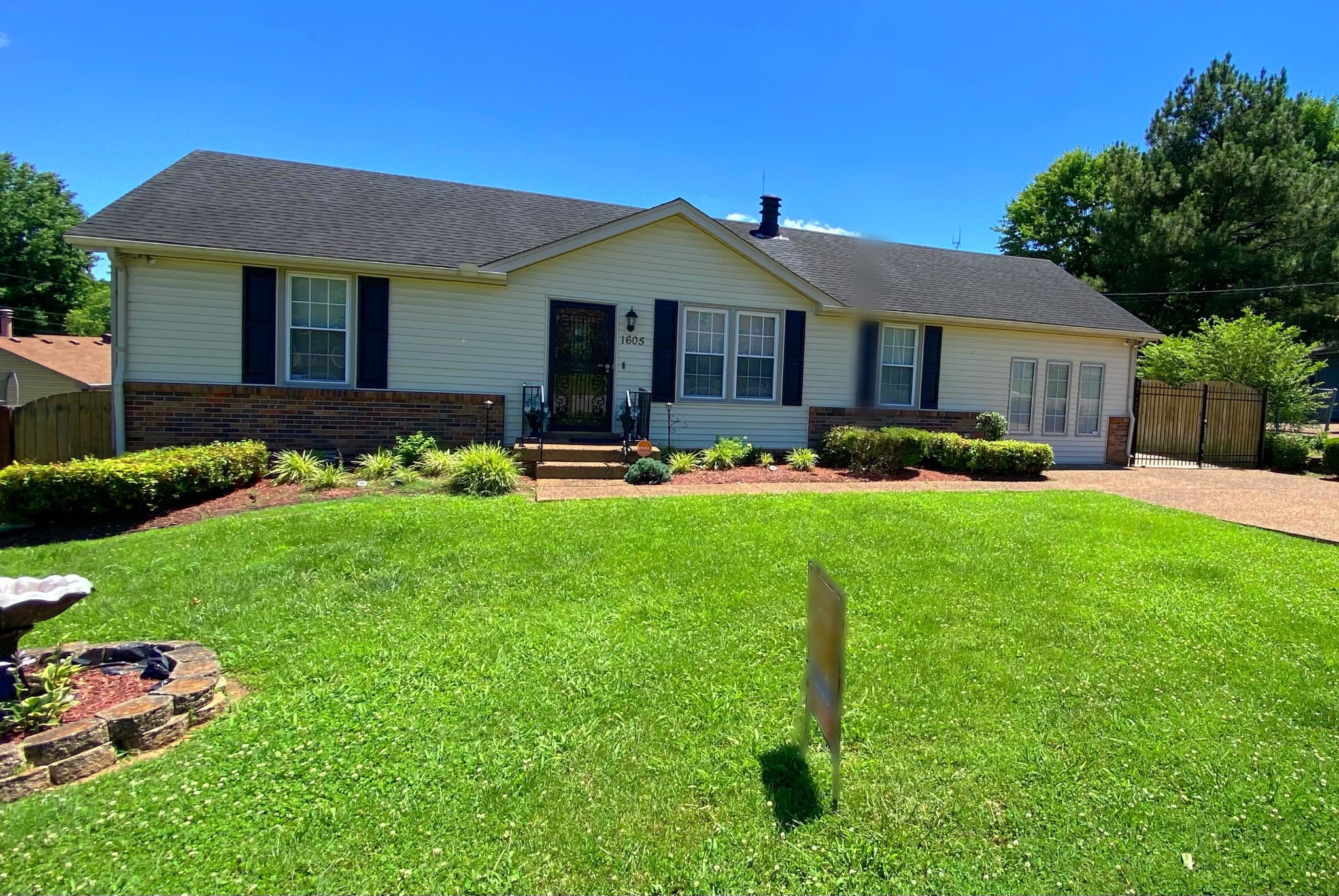 1605 Autumn Ridge Drive Nashville, TN 37207 - Photo 1 of 21 a front view of house with yard and green space