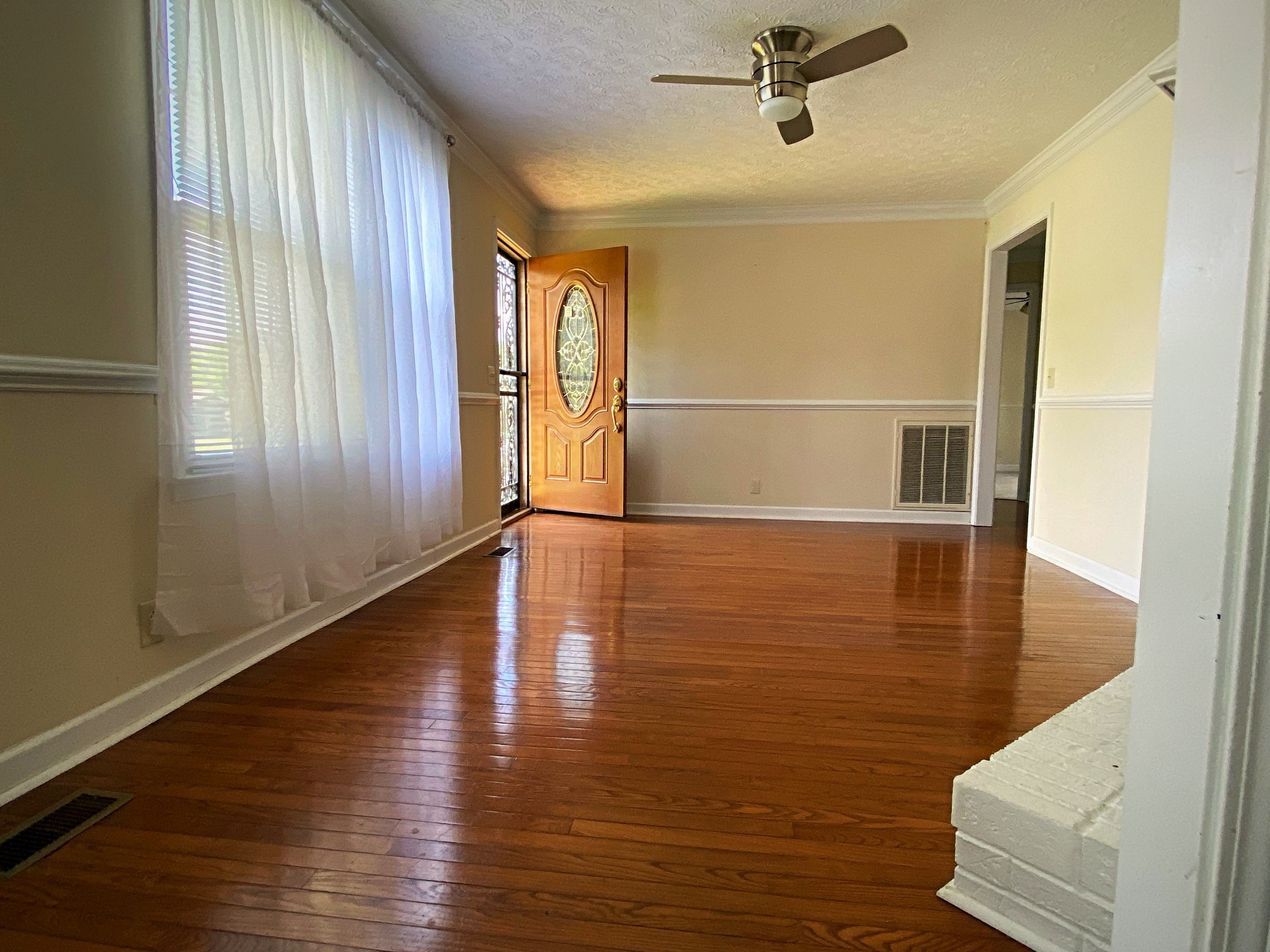 1605 Autumn Ridge Drive Nashville, TN 37207 - Photo 8 of 21 a view of a livingroom with wooden floor and a window
