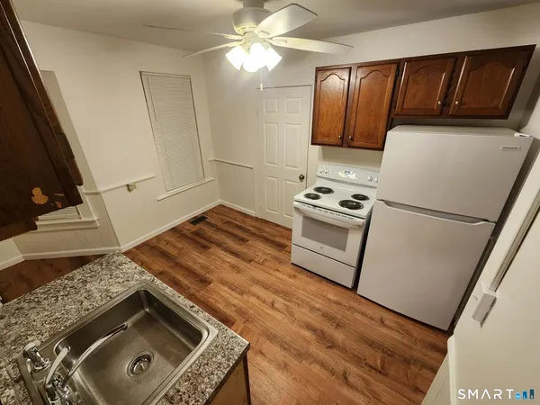 a kitchen with a stove and a microwave