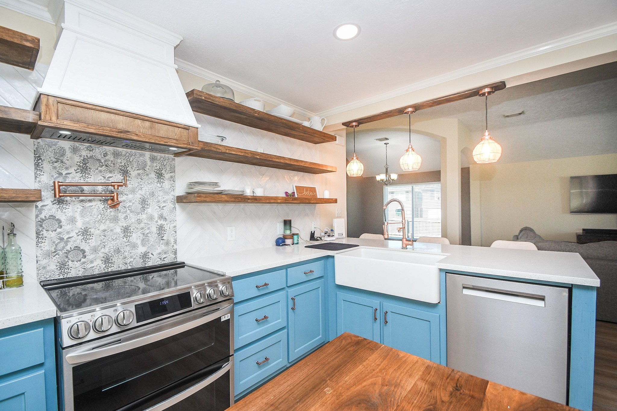 10823 Windswept Montgomery, TX 77356 - Photo 13 of 32 a kitchen with a stove and a sink