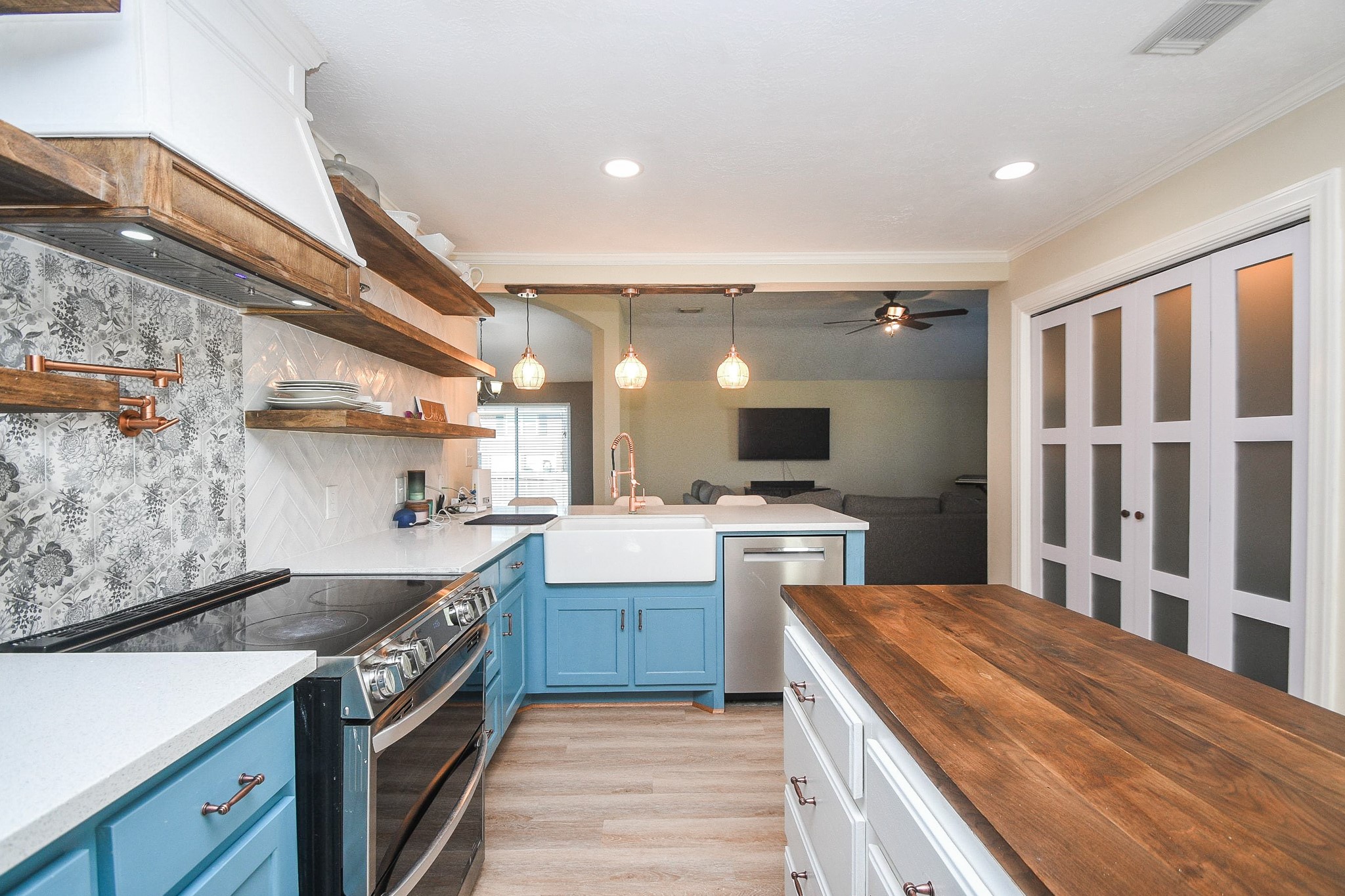 10823 Windswept Montgomery, TX 77356 - Photo 14 of 32 a kitchen with a stove and a sink